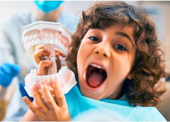 Julho Laranja: dentista Amine Senhorinho realiza ação gratuita para crianças em sua clínica